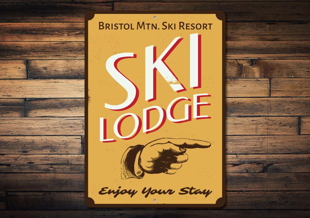 Ski Lodge Enjoy Your Stay Sign made of high-quality aluminum, featuring customizable text and pre-drilled holes for easy mounting.