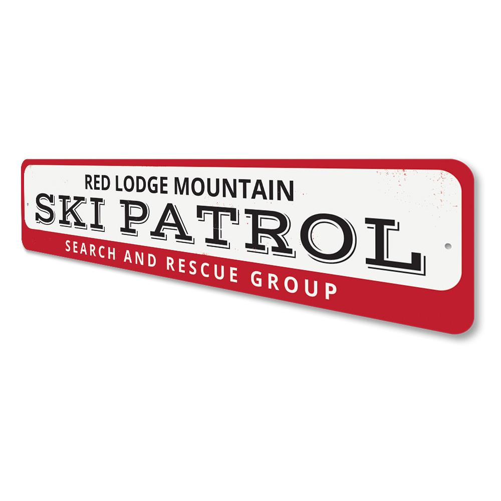 Ski Patrol Mountain Sign made of high-quality aluminum, featuring a decorative design perfect for ski lovers, mounted on a wall.