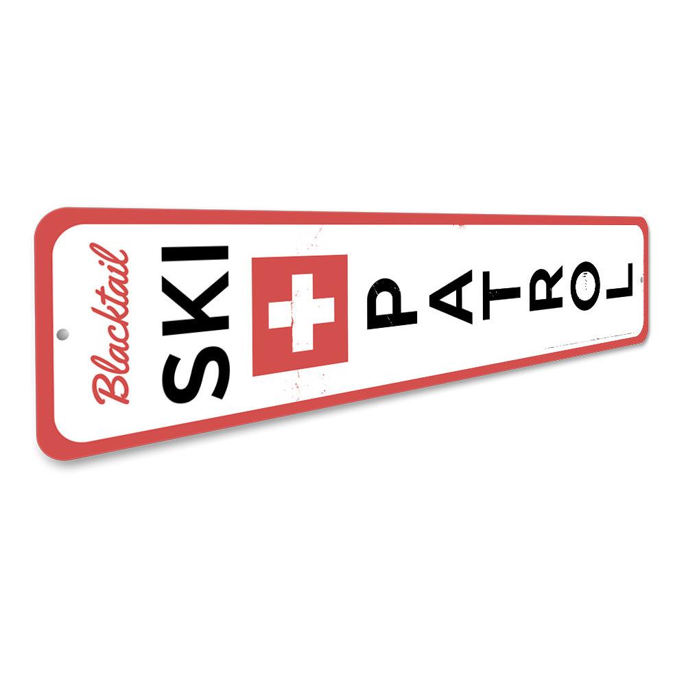 Ski Patrol Vertical Sign made of high-quality aluminum, featuring a vibrant design perfect for ski enthusiasts and lodge decor.