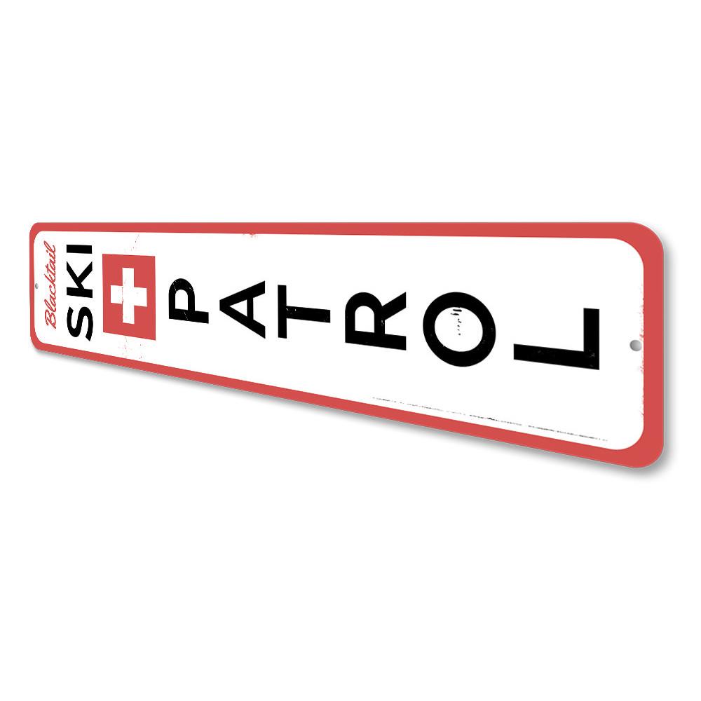 Ski Patrol Vertical Sign made of high-quality aluminum, featuring a vibrant design perfect for ski enthusiasts and lodge decor.