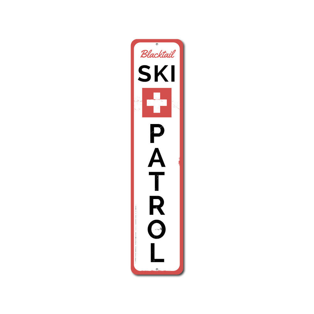 Ski Patrol Vertical Sign made of high-quality aluminum, featuring a vibrant design perfect for ski enthusiasts and lodge decor.