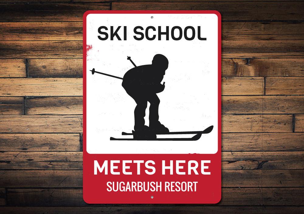 Ski School Meets Here decorative sign made of aluminum, featuring customizable text and pre-drilled holes for easy mounting.