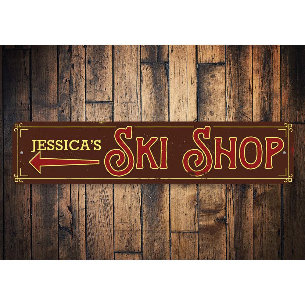 Ski Shop Arrow Sign made of high-quality aluminum, featuring a decorative arrow design perfect for indoor or outdoor use.