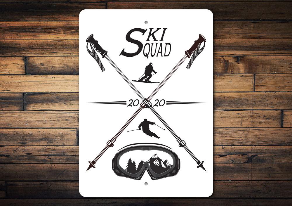 A custom Ski Squad Sign made of durable aluminum, featuring ski-themed graphics and customizable text, perfect for home decor.