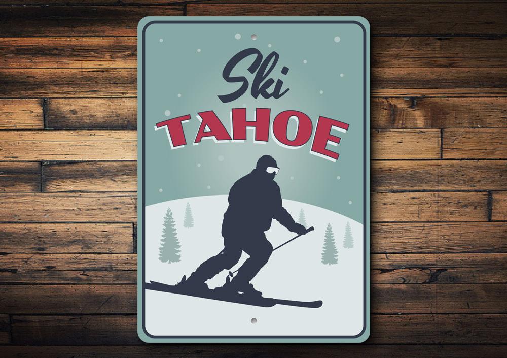 Ski Tahoe Sign made of durable aluminum, featuring a decorative design perfect for ski lovers, mounted on a wall.