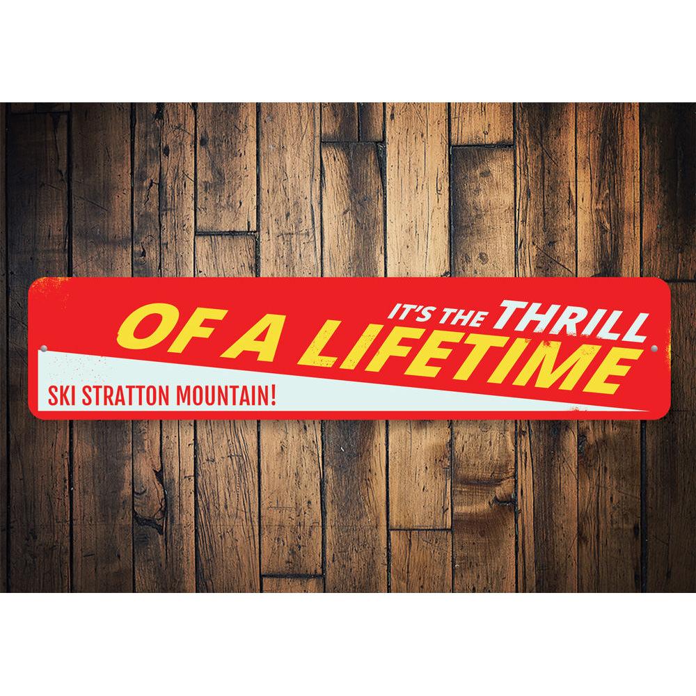 Ski Thrill of a Lifetime Sign made of aluminum, featuring a vibrant design perfect for ski enthusiasts and lodge decor.