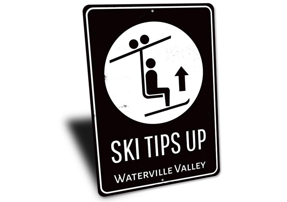 Ski Tips Up Destination Sign made of durable aluminum, featuring a ski-themed design perfect for lodge decor.