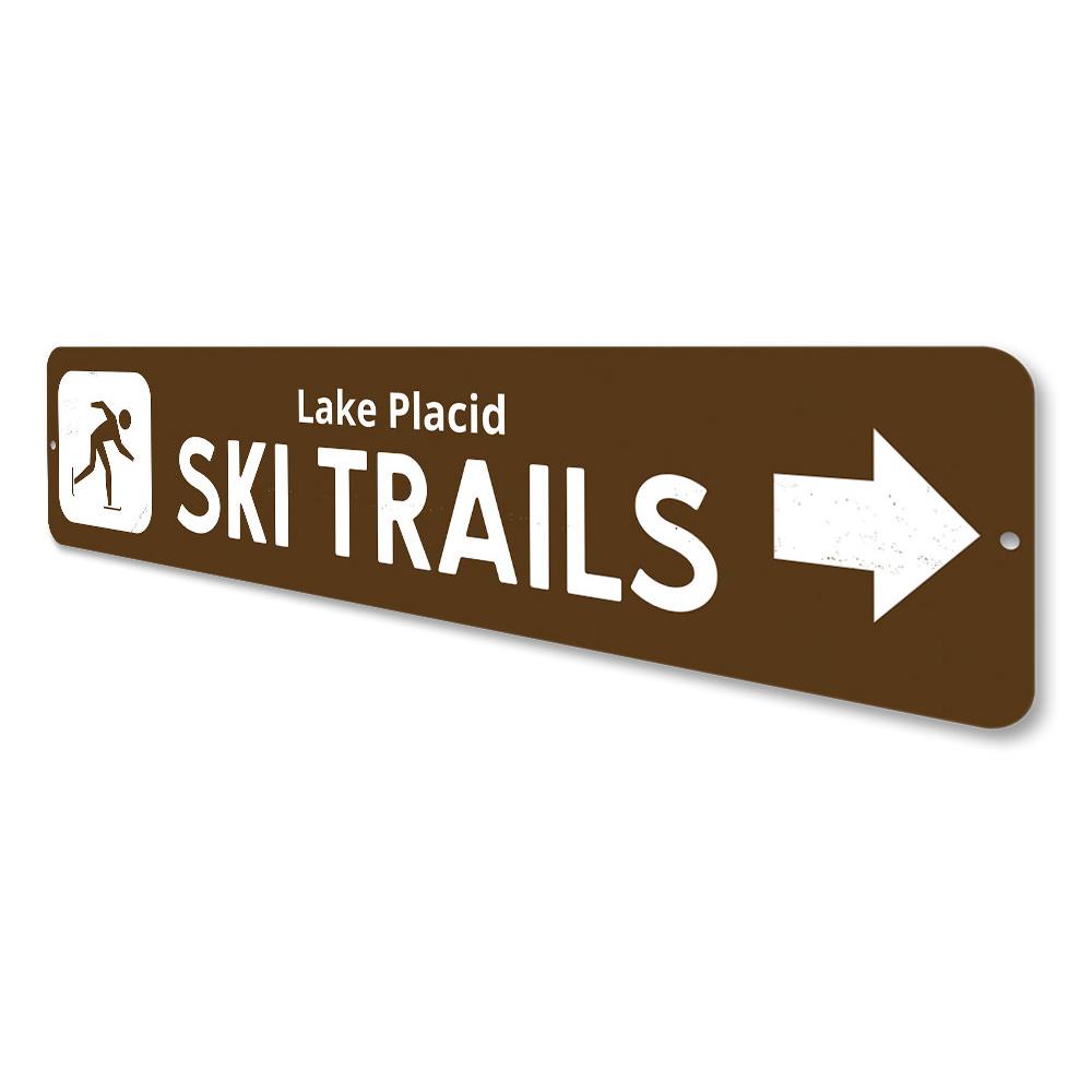 Ski Trails Arrow Sign made of durable aluminum, featuring customizable text and pre-drilled holes for easy mounting, perfect for lakehouse decor.