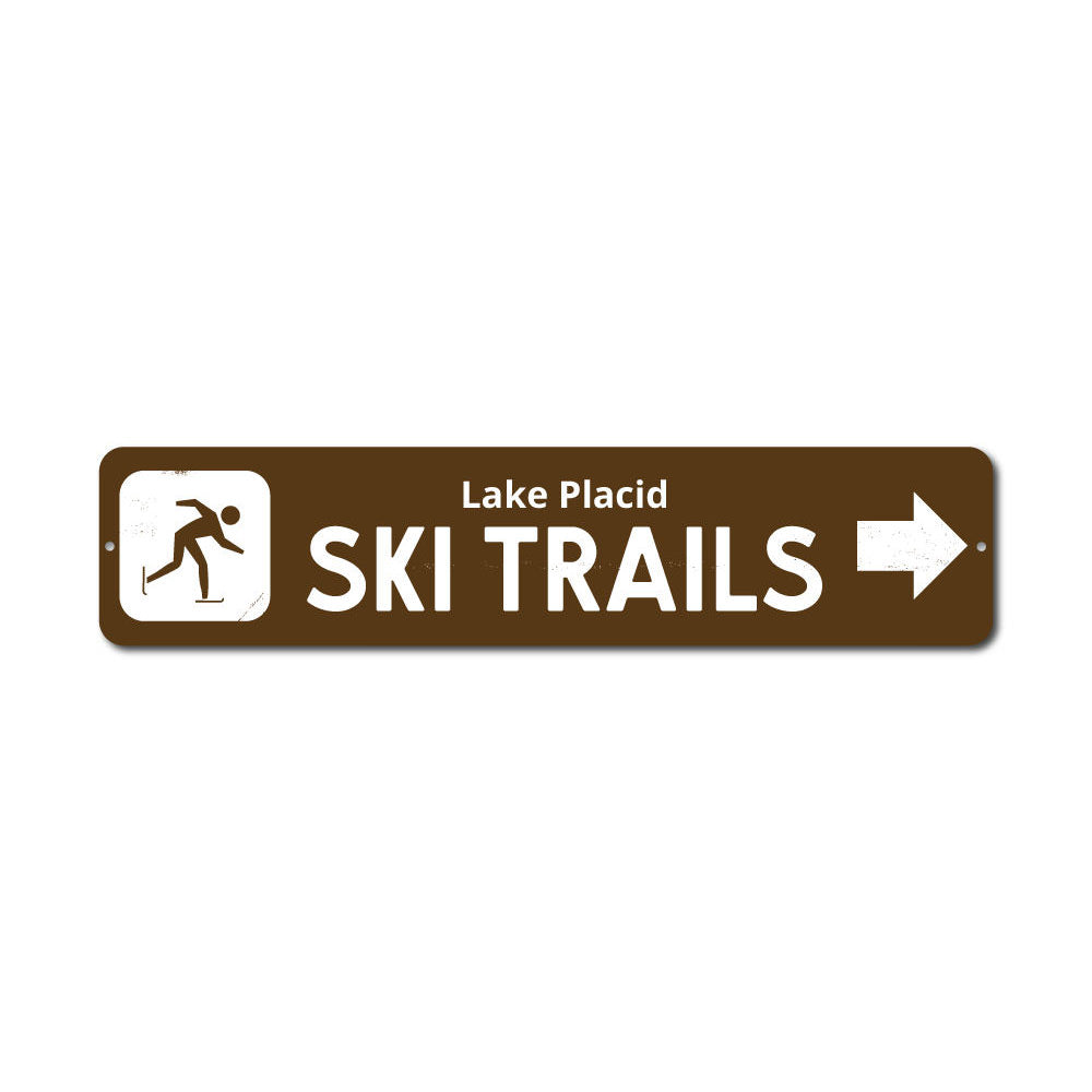 Ski Trails Arrow Sign made of durable aluminum, featuring customizable text and pre-drilled holes for easy mounting, perfect for lakehouse decor.