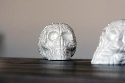 Skull Brain sculpture by Emilio Garcia, crafted from extra white porcelain, featuring a unique skull and brain design.