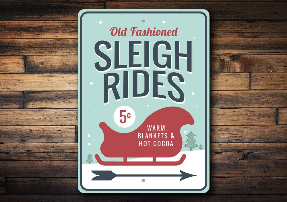 A festive Sleigh Rides Arrow Sign made of durable aluminum, featuring a charming design perfect for holiday decorations.