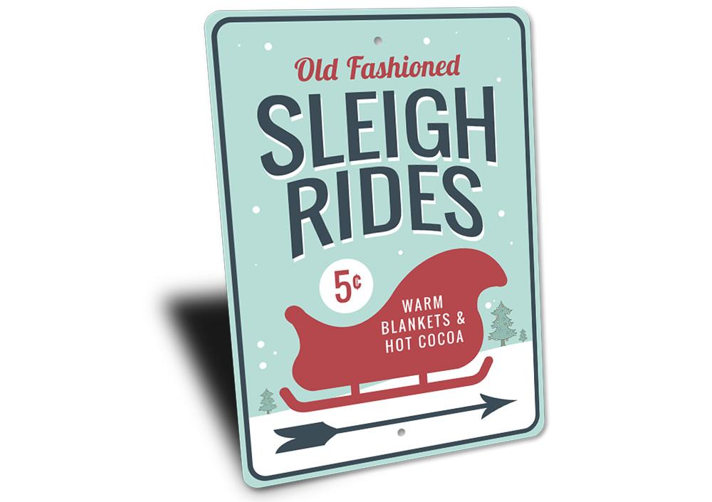 A festive Sleigh Rides Arrow Sign made of durable aluminum, featuring a charming design perfect for holiday decorations.