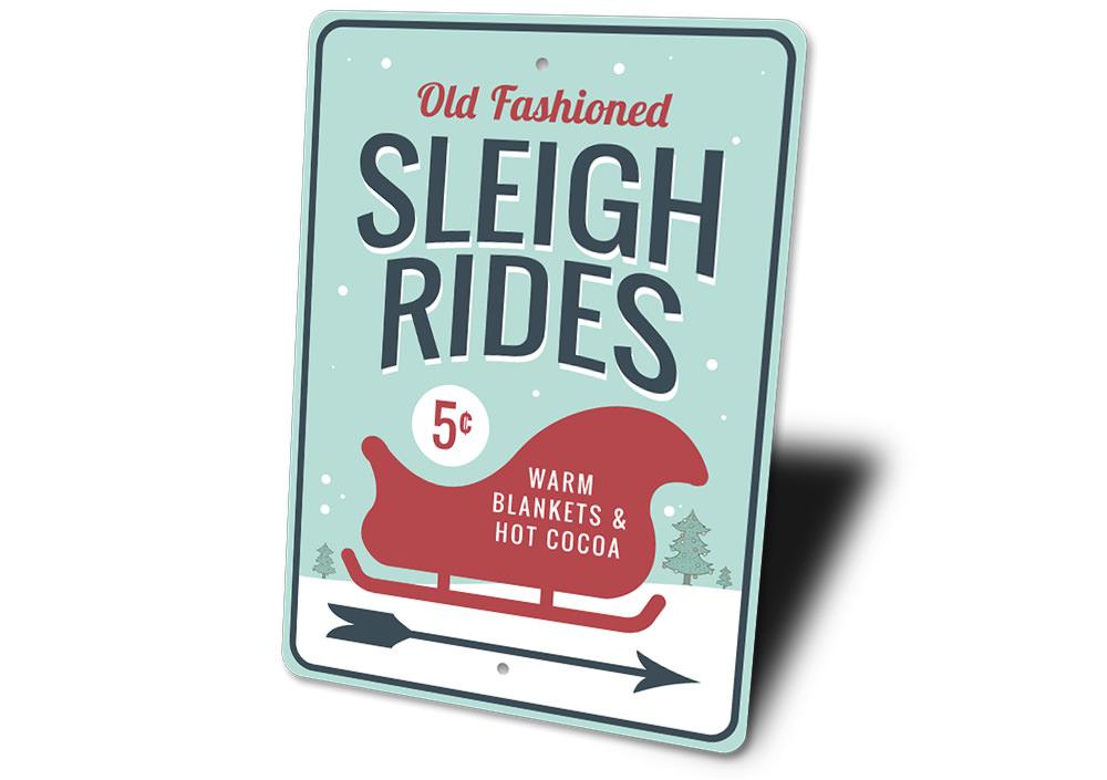 A festive Sleigh Rides Arrow Sign made of durable aluminum, featuring a charming design perfect for holiday decorations.