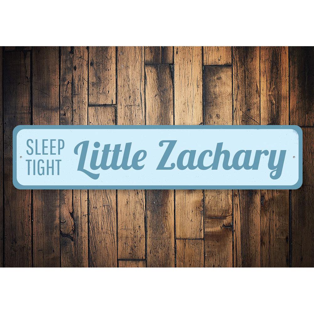 Sleep Tight Little Baby Sign made of high-quality aluminum, featuring a charming design perfect for a nursery or child's room.