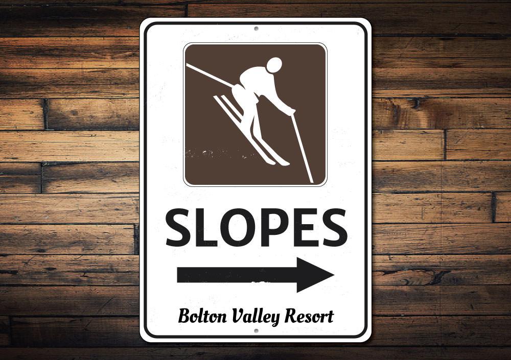 Slopes Arrow Sign made of high-quality aluminum, customizable with personal text, featuring pre-drilled holes for easy mounting.