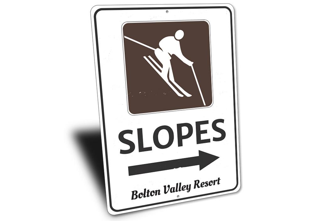 Slopes Arrow Sign made of high-quality aluminum, customizable with personal text, featuring pre-drilled holes for easy mounting.