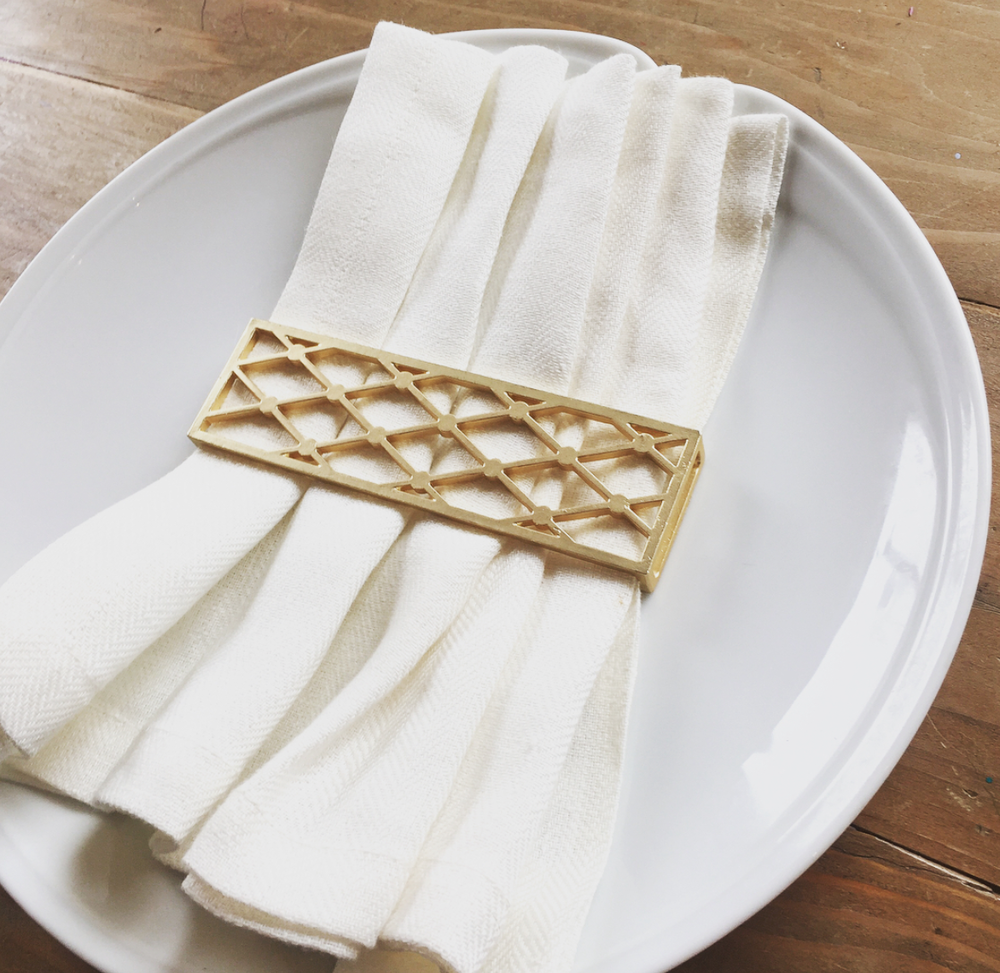 Small Trellis Wrap in Matte Gold, featuring an elegant trellis design perfect for napkin decoration.