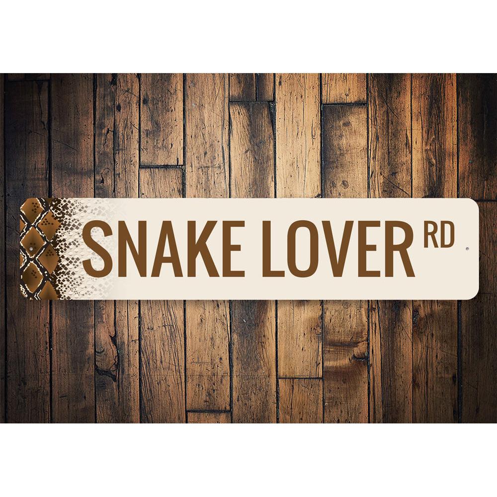 A decorative Snake Lover Street Sign made of high-quality aluminum, featuring a vibrant design perfect for snake enthusiasts.