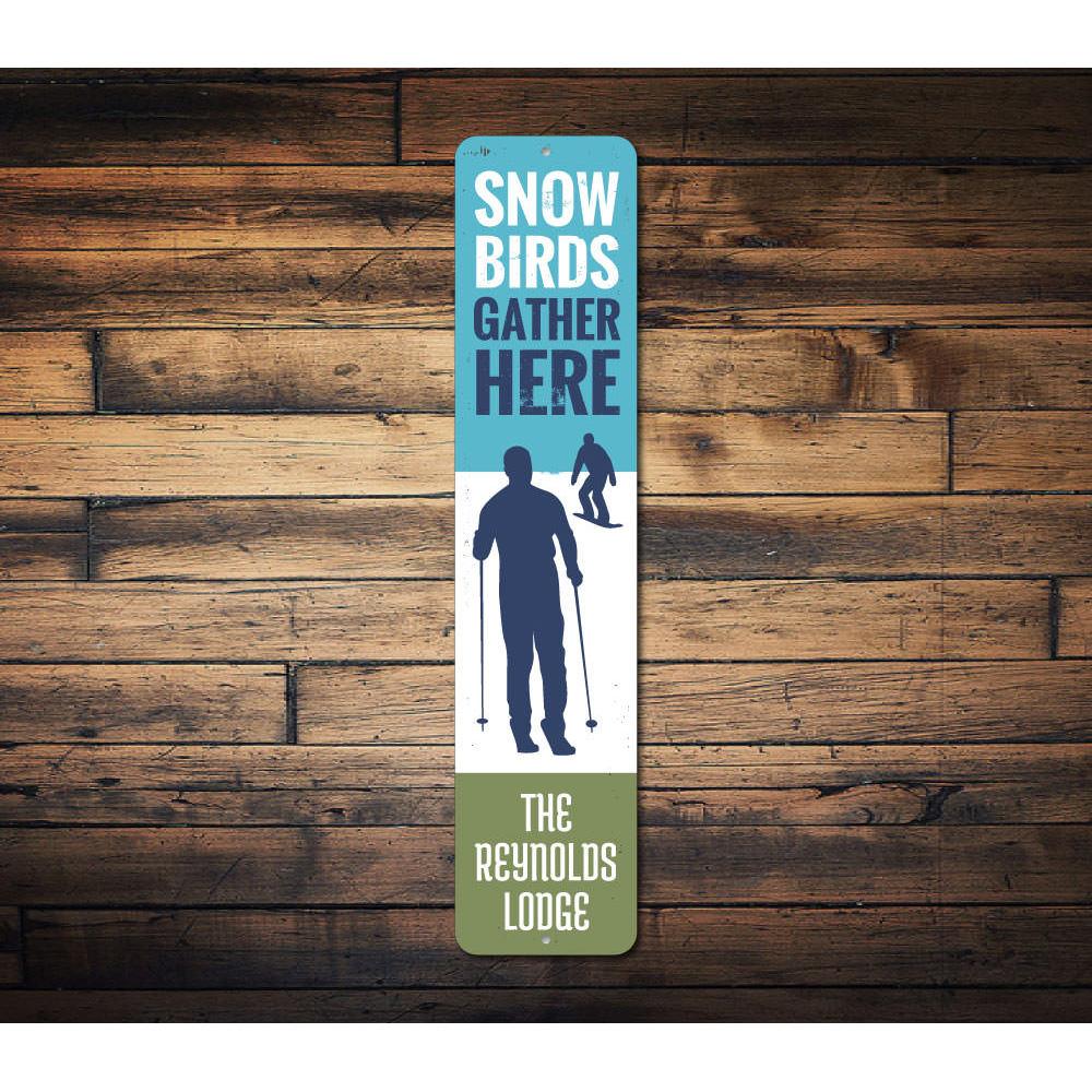 Snow Birds Gather Here Sign made of high-quality aluminum, featuring a charming design perfect for home decor.