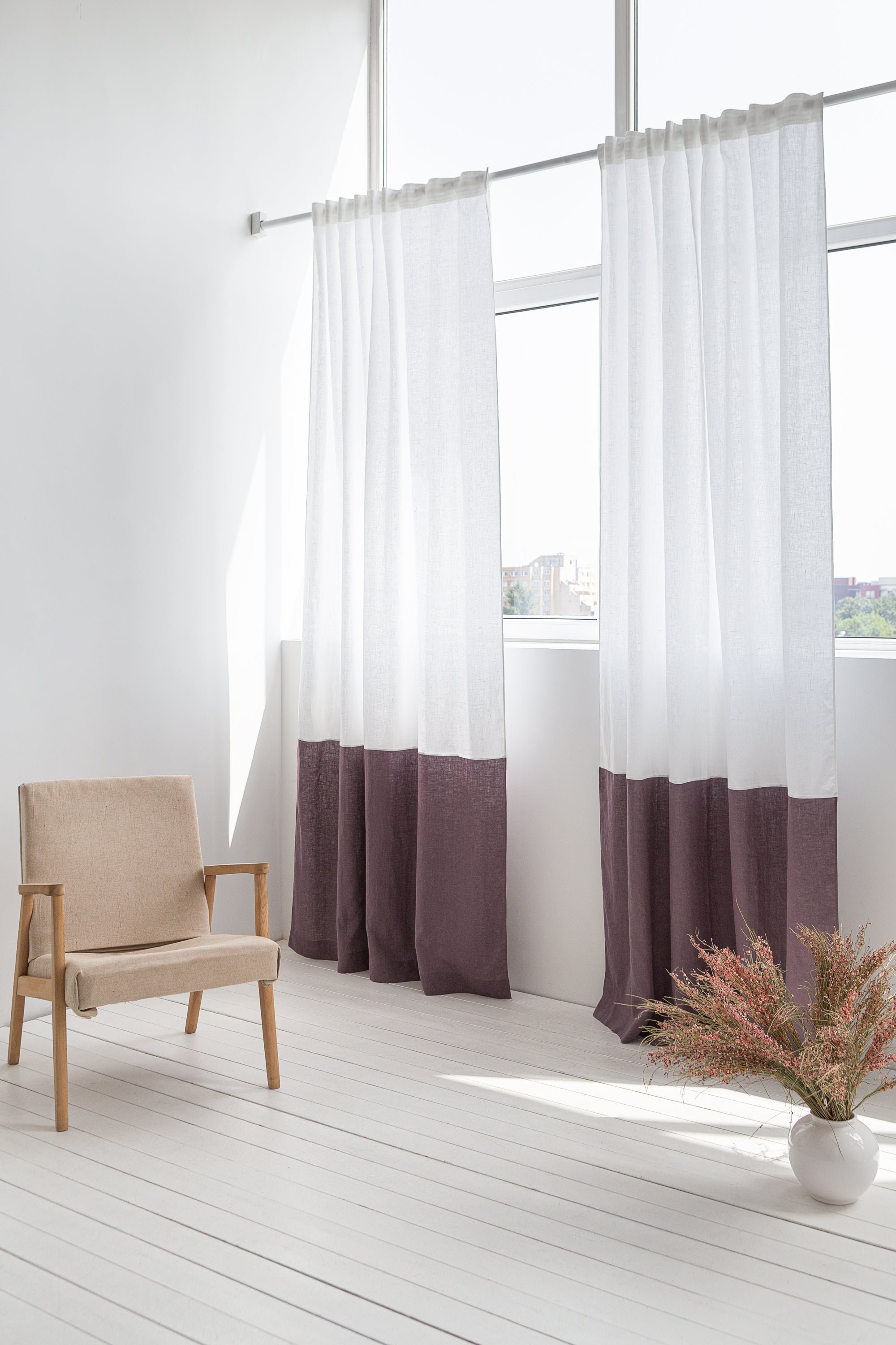 Elegant Snow White and Grey linen curtains with multifunctional tape heading, showcasing a modern two-tone design in a bright room.