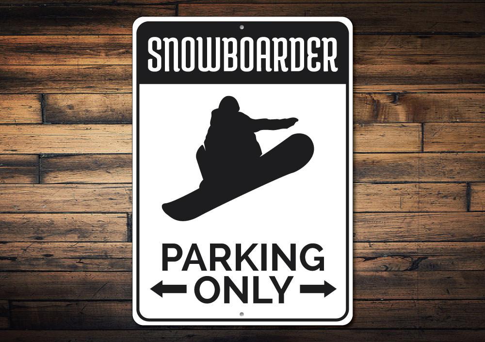 A vibrant Snowboarding Parking Sign made of durable aluminum, featuring a snowboarding graphic and customizable text options.