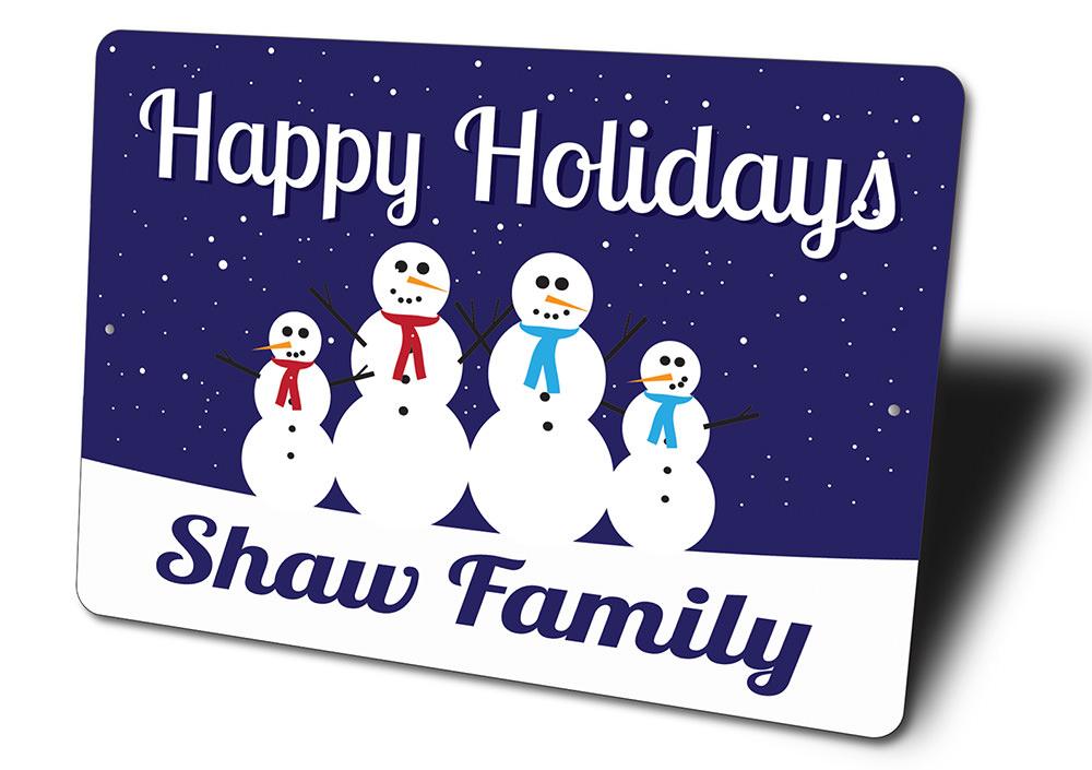 A festive Snowmen Sign featuring cheerful snowmen in a winter scene, perfect for Christmas decorations.