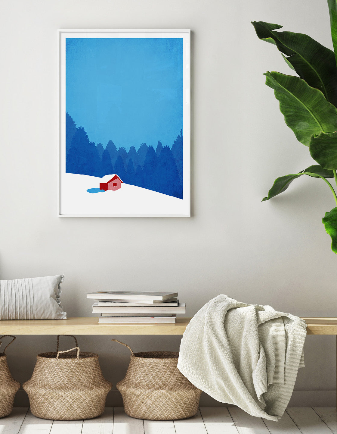 Art print of a snowy mountain hut, showcasing a serene winter landscape with a rustic cabin surrounded by snow-covered trees.