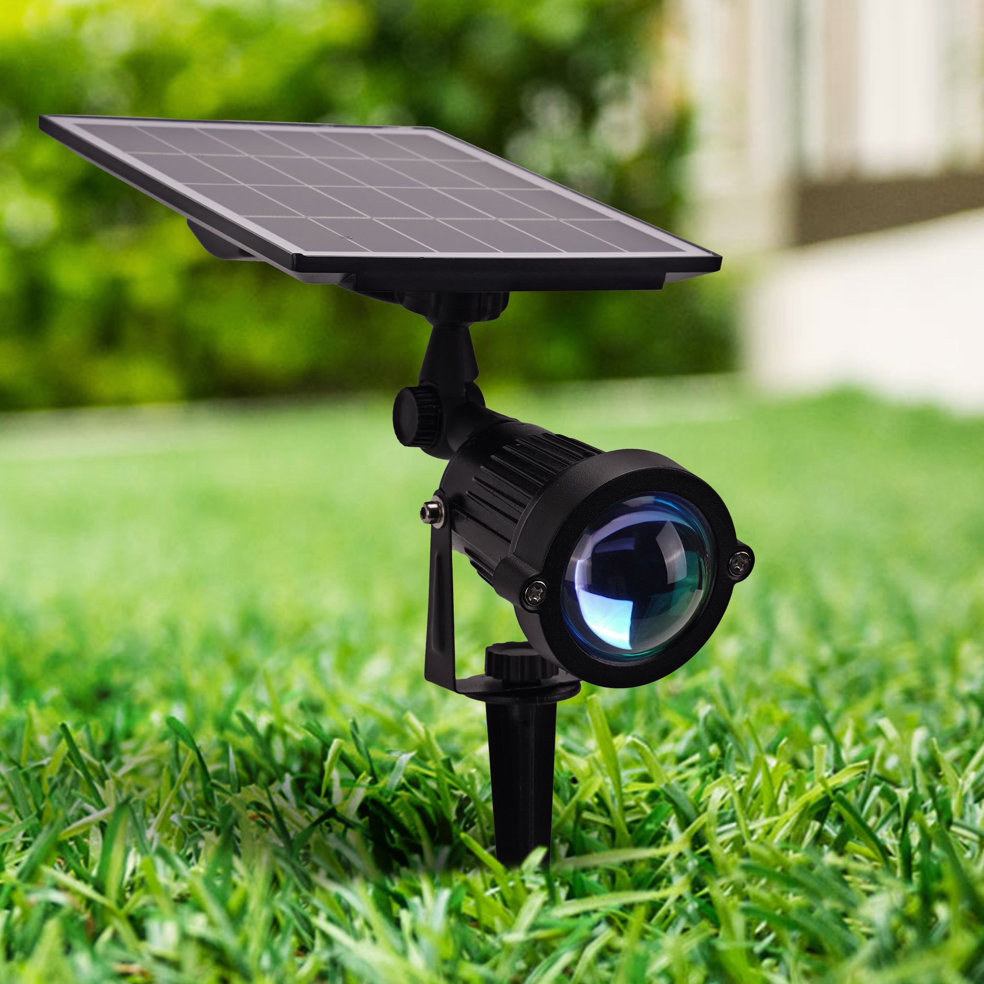 Solar Power Outdoor Sunset Projector Light illuminating a garden pathway with a warm sunset projection.