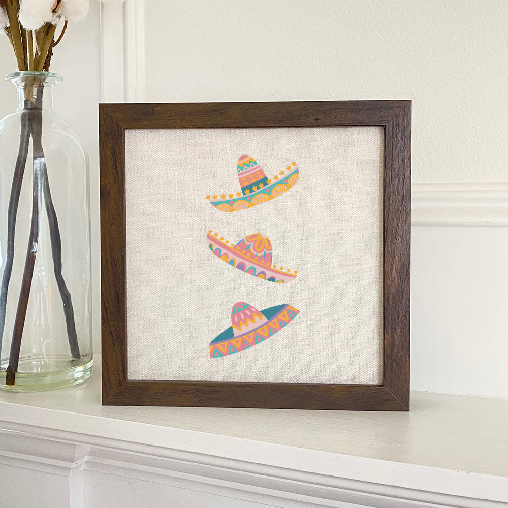 Sombreros Framed Sign with a stylish wood frame and linen-look background, perfect for home decor.