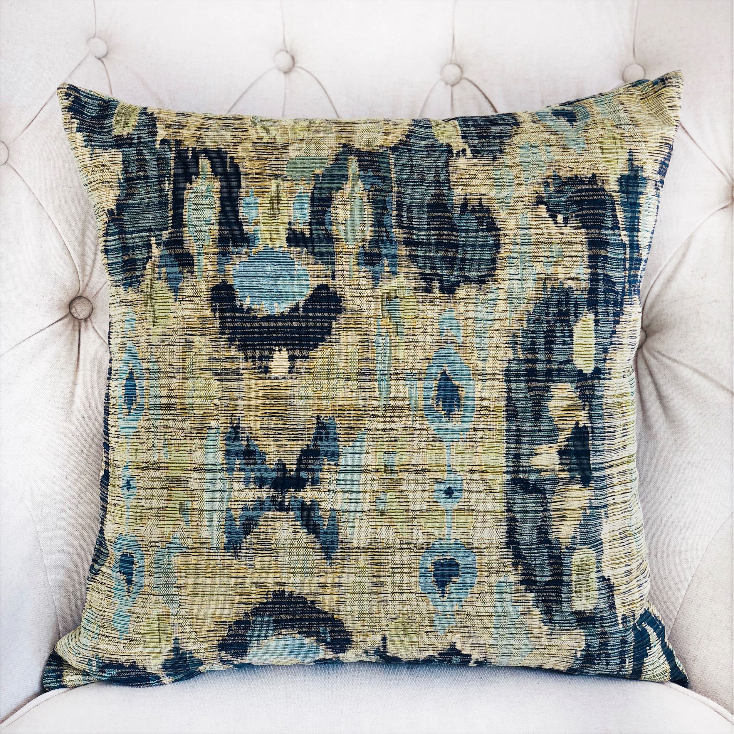 Sonoma Canyon Green Navy and Blue Handmade Luxury Pillow featuring Ikat pattern and invisible zipper closure, showcasing vibrant colors and luxurious fabric.