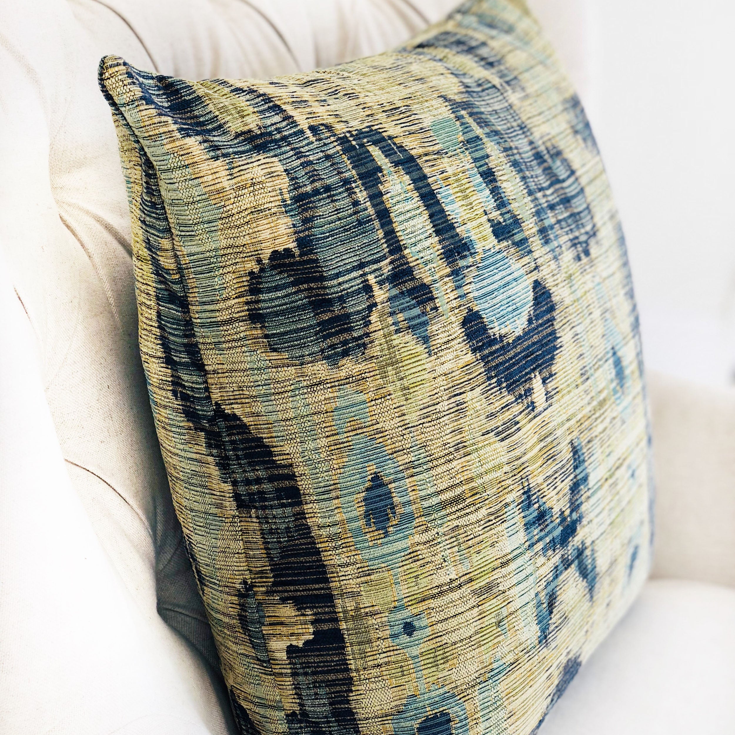 Sonoma Canyon Green Navy and Blue Handmade Luxury Pillow featuring Ikat pattern and invisible zipper closure, showcasing vibrant colors and luxurious fabric.