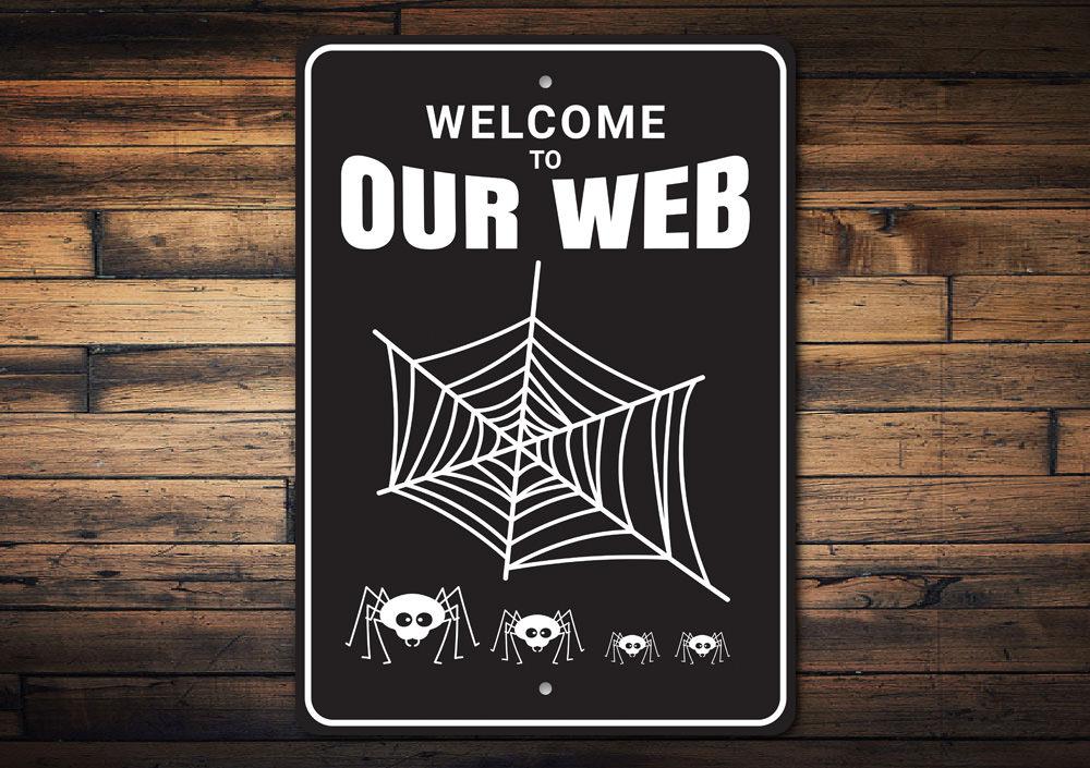 A spooky Spider Web Sign made of durable aluminum, featuring intricate web designs perfect for Halloween decor.