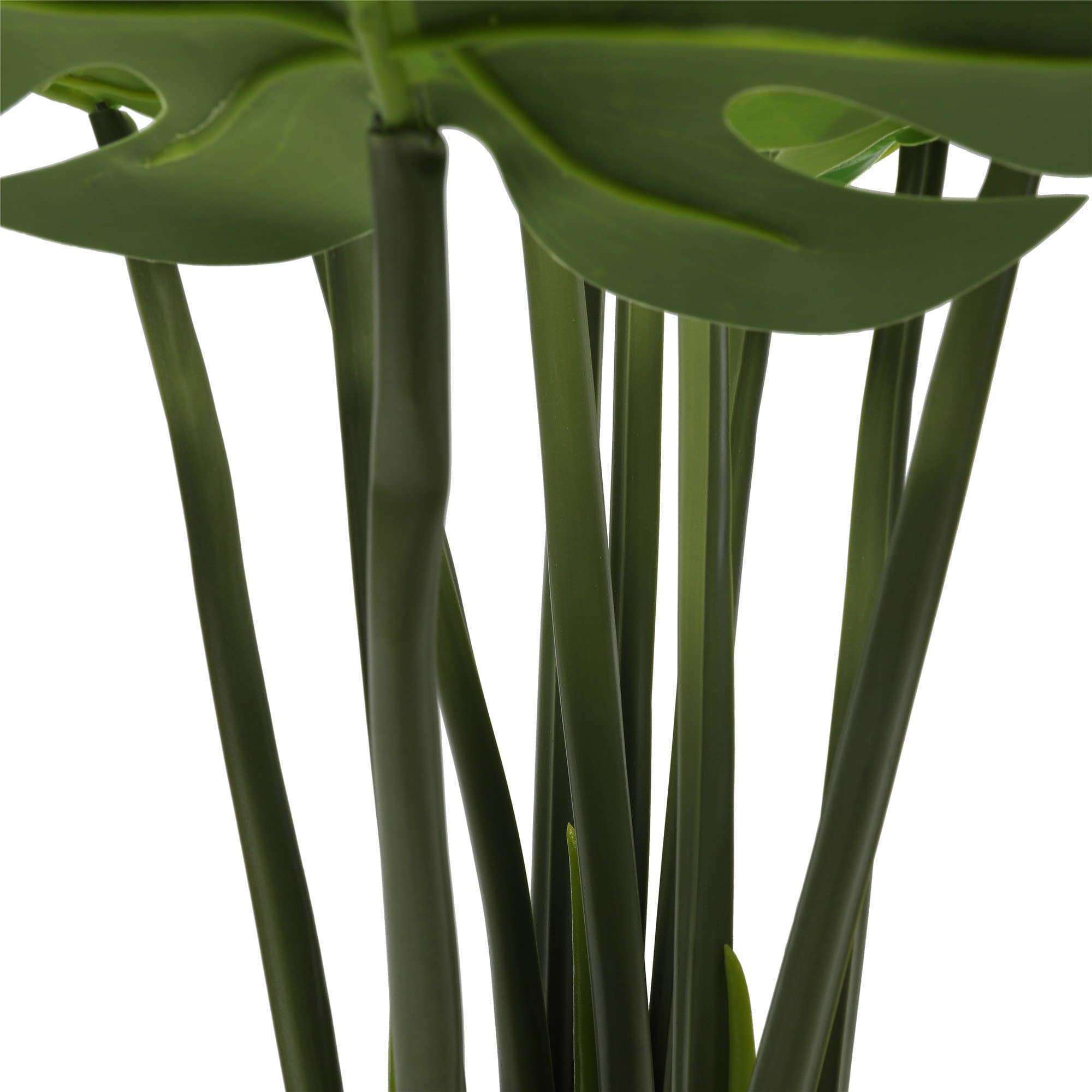 A 120cm tall faux Split Philodendron with detailed leaves in a black pot, perfect for home decor.