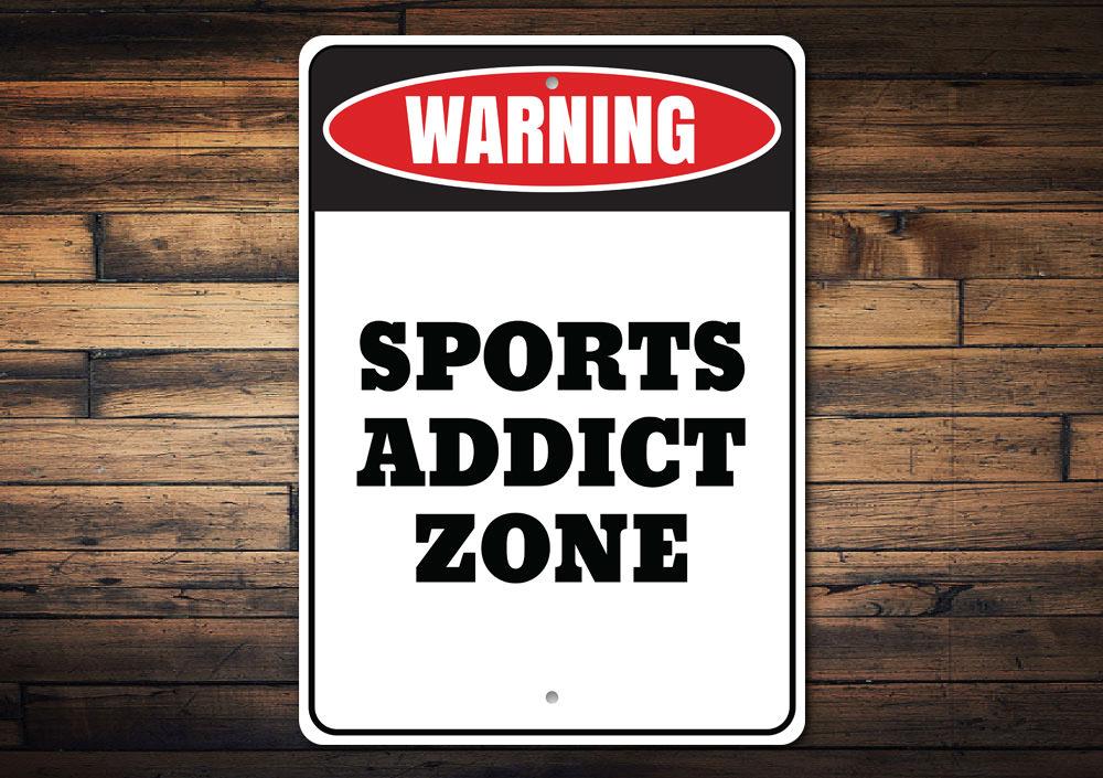 A decorative Sports Addict Zone Sign made of high-quality aluminum, featuring vibrant colors and customizable text, perfect for sports enthusiasts.