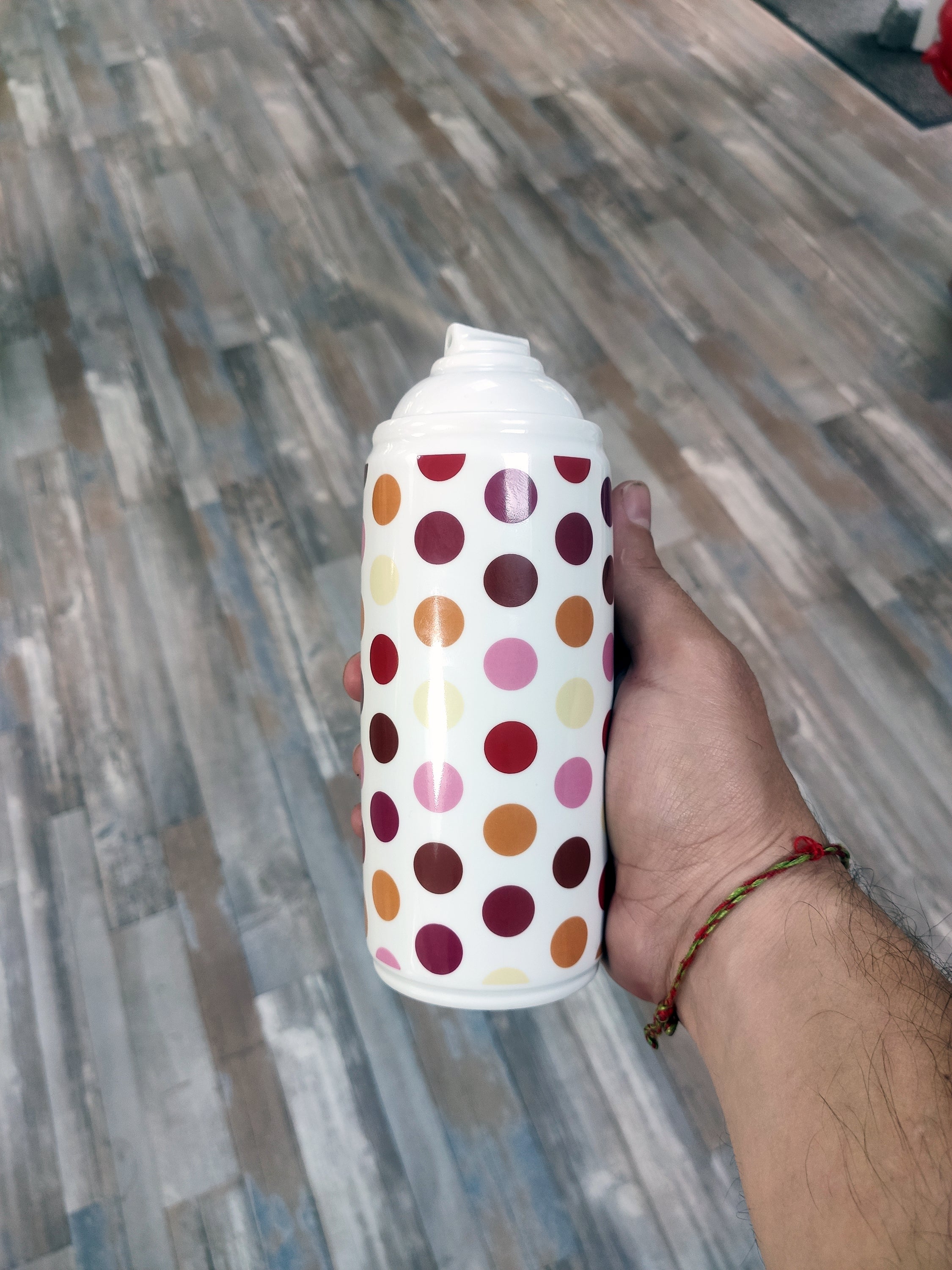 Spray Paint Polka Dot Porcelain by NooN, showcasing unique spray paint design on elegant white porcelain.