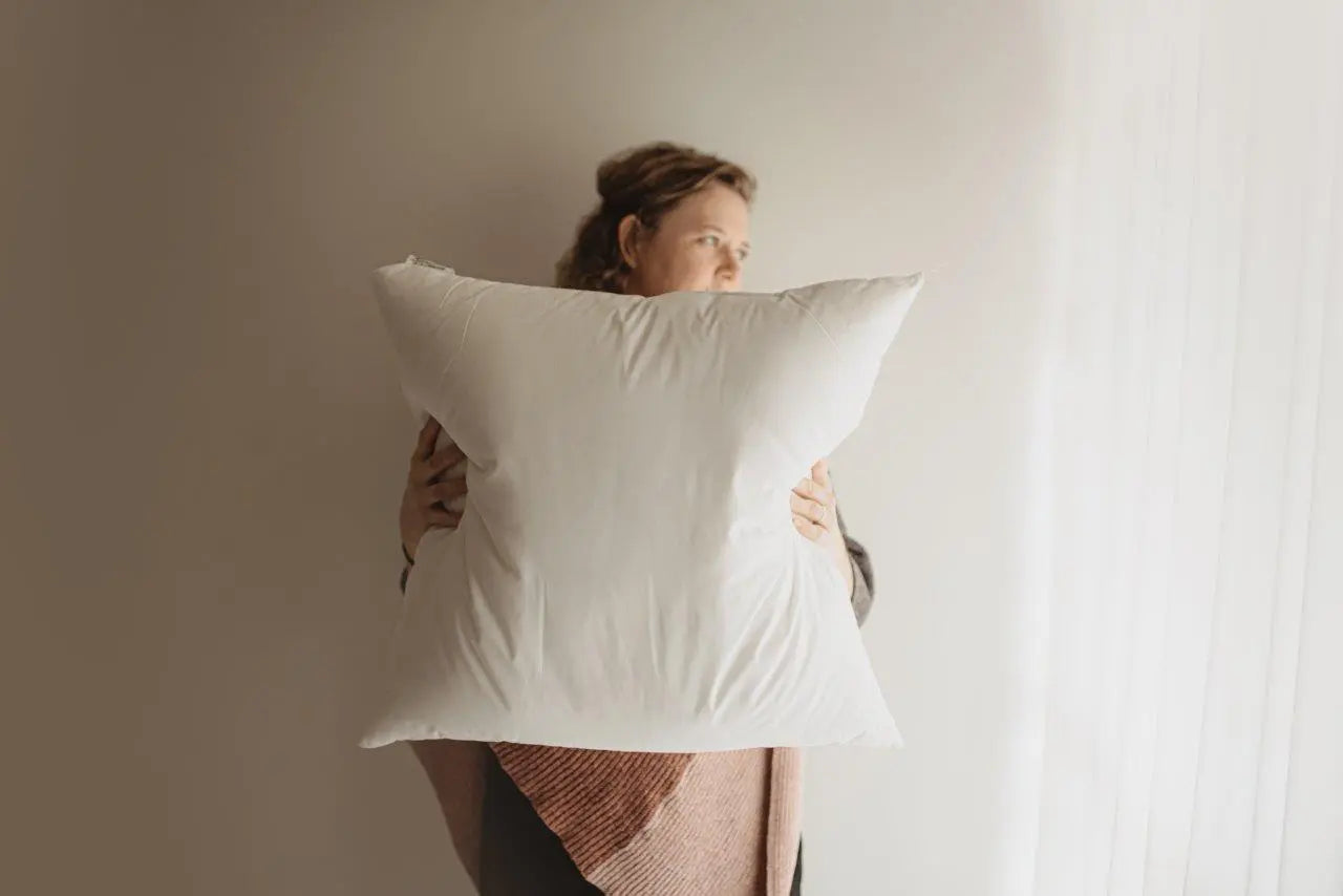 Bulk square pillow inserts in various sizes, showcasing their soft and durable fabric, ideal for decorative pillows.