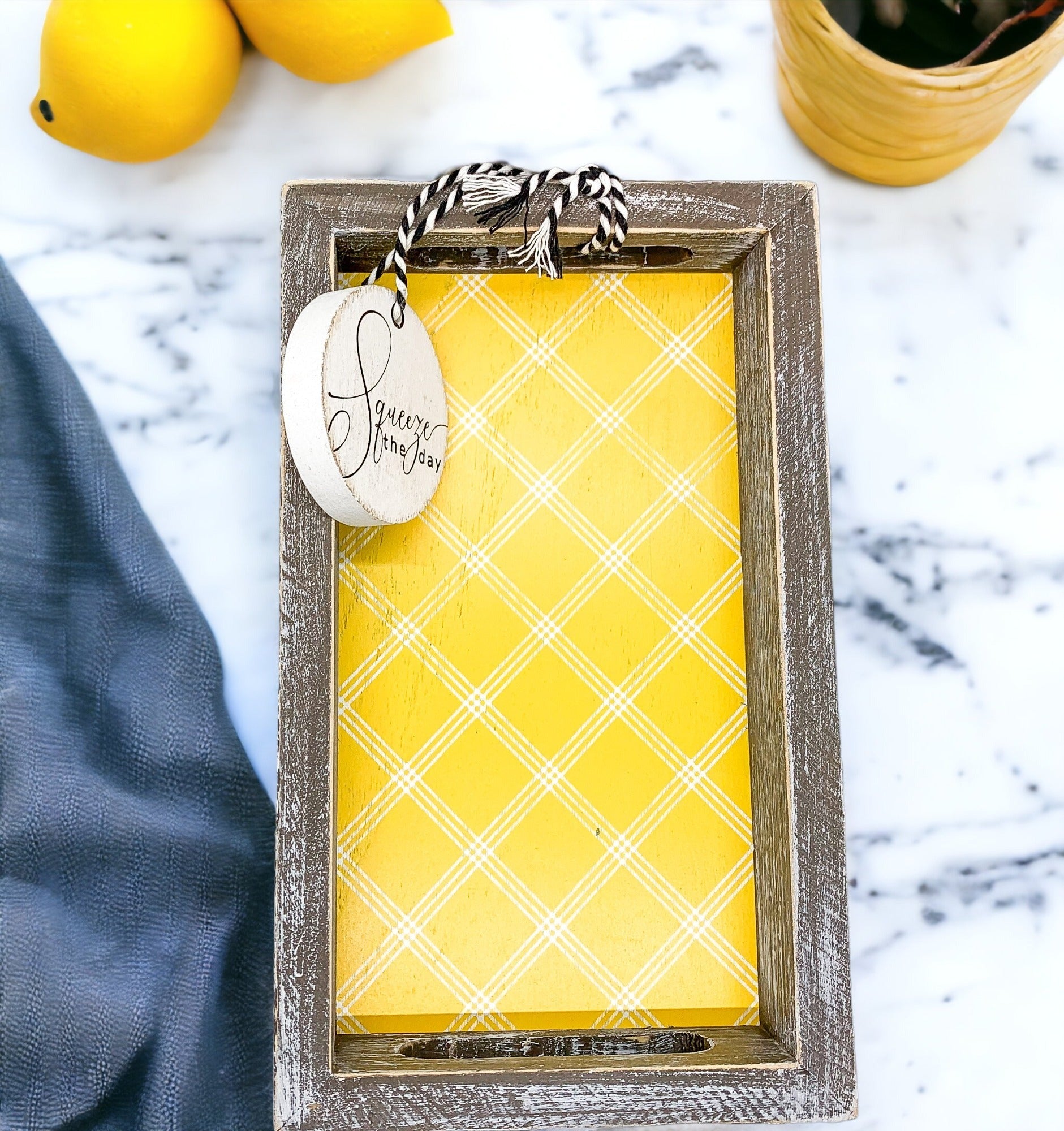 Handmade wooden tray with yellow striped interior and double-sided ornament featuring 'Squeeze The Day' and a lemon.