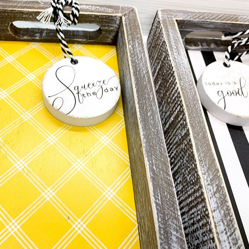 Handmade wooden tray with yellow striped interior and double-sided ornament featuring 'Squeeze The Day' and a lemon.