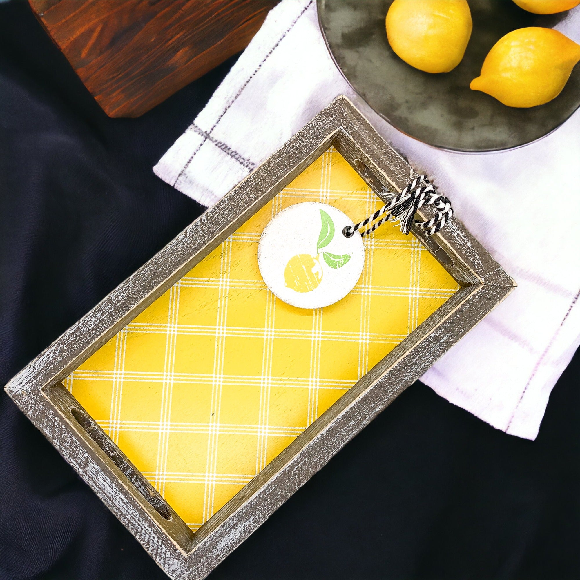 Handmade wooden tray with yellow striped interior and double-sided ornament featuring 'Squeeze The Day' and a lemon.