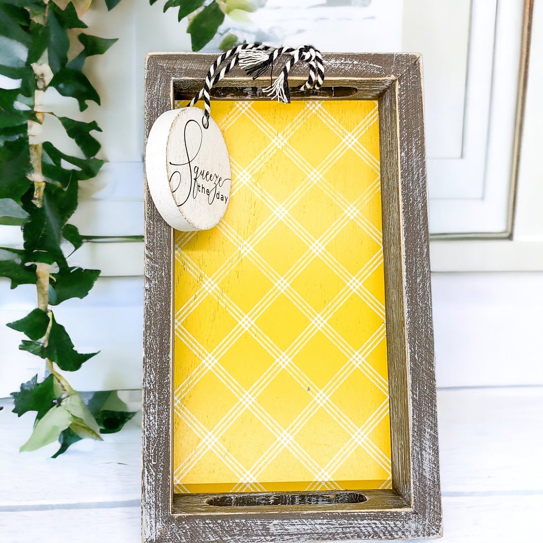 Handmade wooden tray with yellow striped interior and double-sided ornament featuring 'Squeeze The Day' and a lemon.