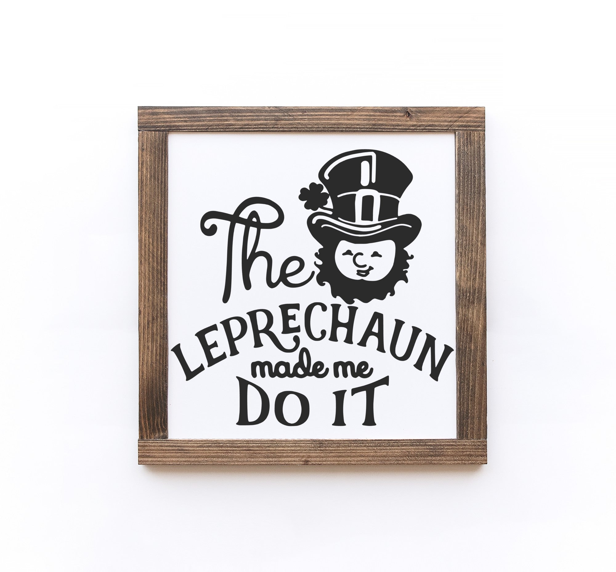 Handmade St. Patrick's Day wooden sign with white background and painted lettering, available in two sizes.