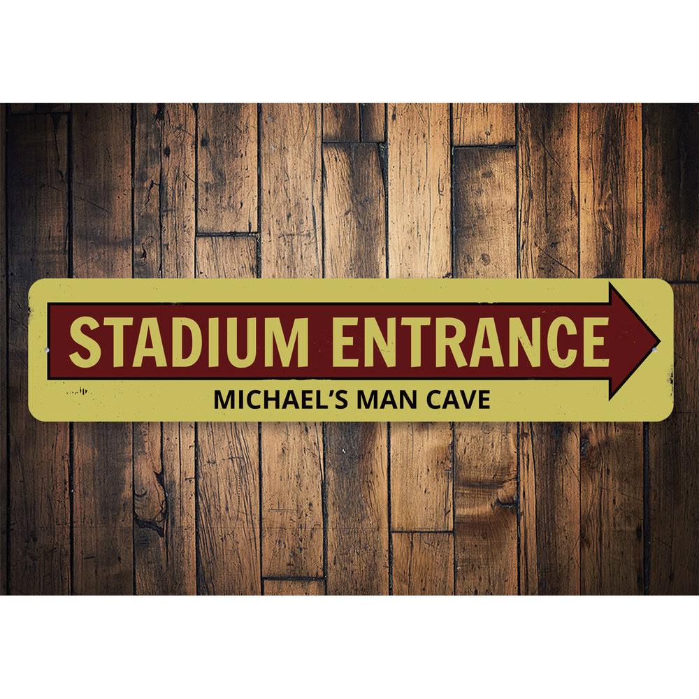 Stadium Entrance Arrow Sign made of high-quality aluminum, featuring customizable text and pre-drilled holes for easy mounting.