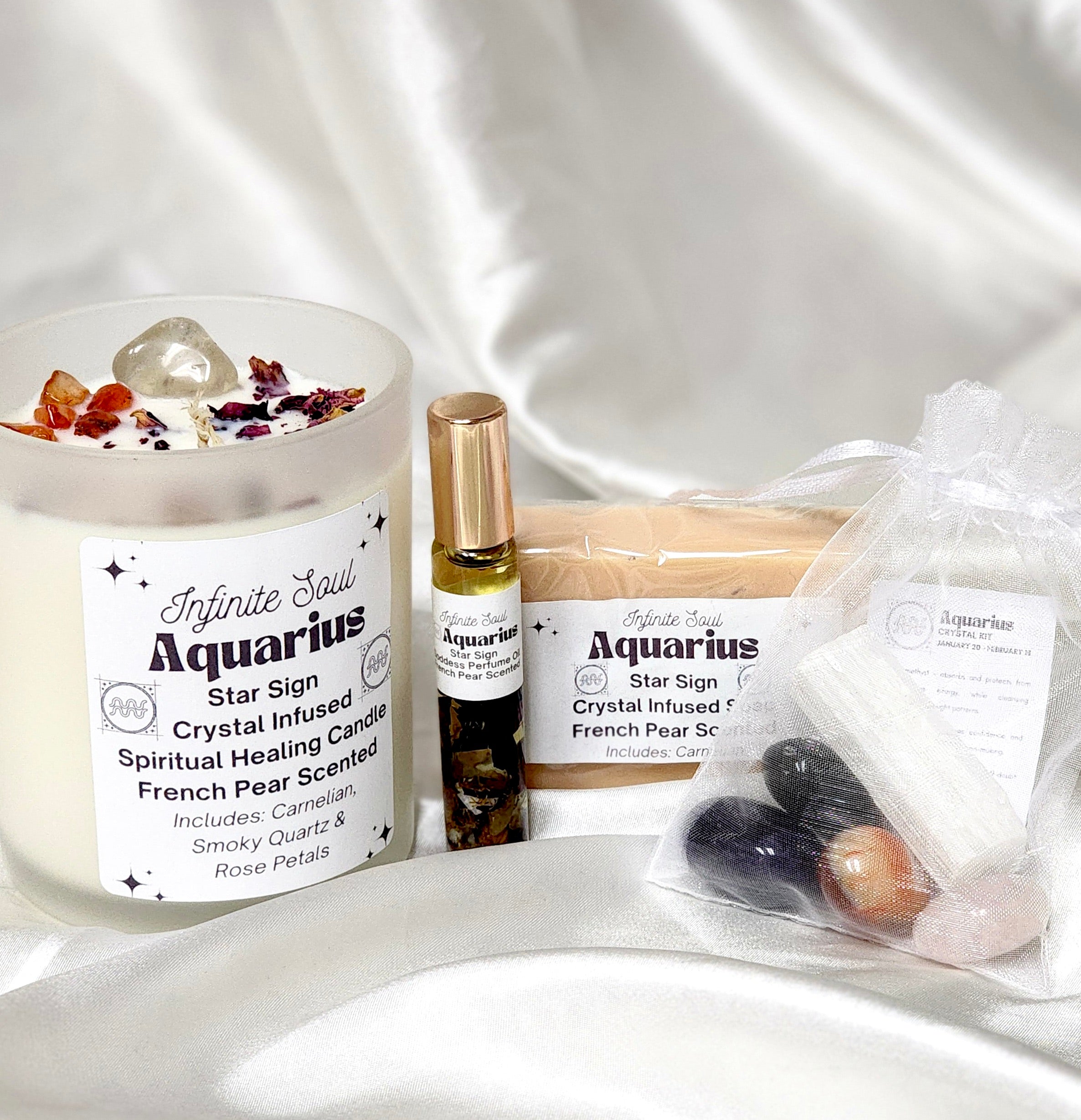 Star Sign Bundle: The Aquarius Collection featuring a healing candle, jewelry, perfume oil, and crystal kit, all designed for spiritual wellness.