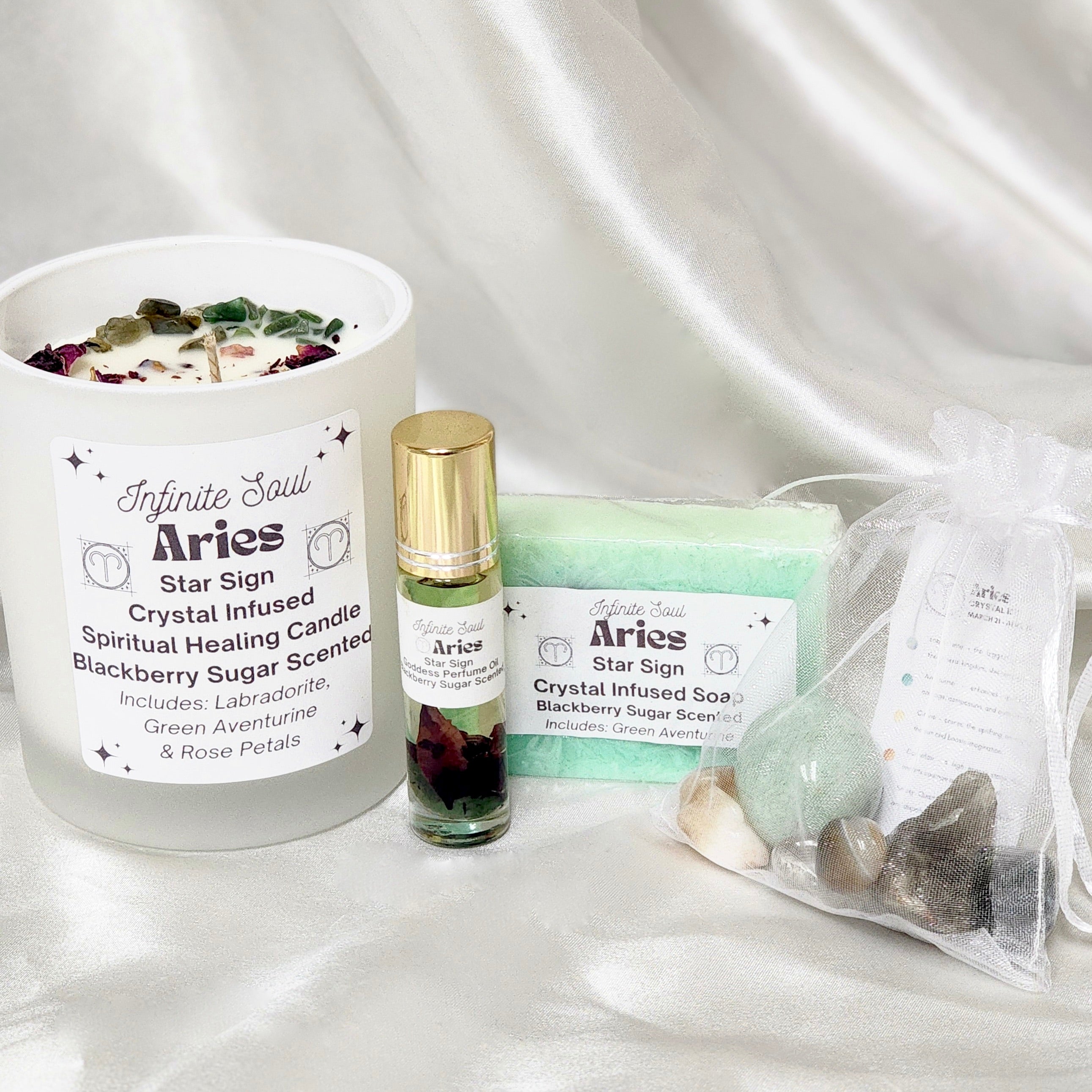 Star Sign Bundle: The Aries Collection featuring a healing candle, crystal kit, and perfume oil, all with Black Raspberry Sugar scent.