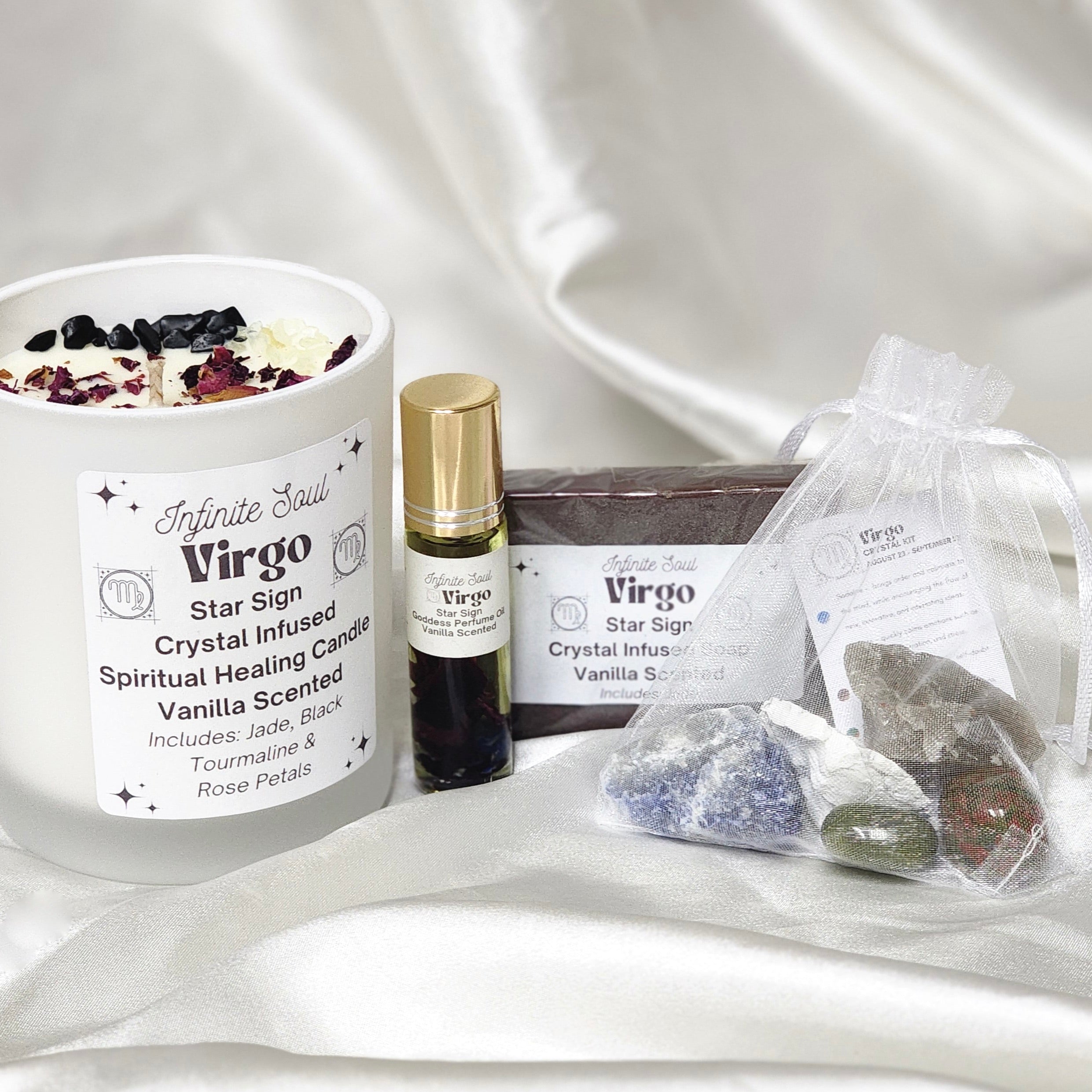 Star Sign Bundle featuring Virgo Collection with candle, necklace, earrings, and perfume oil, beautifully arranged.