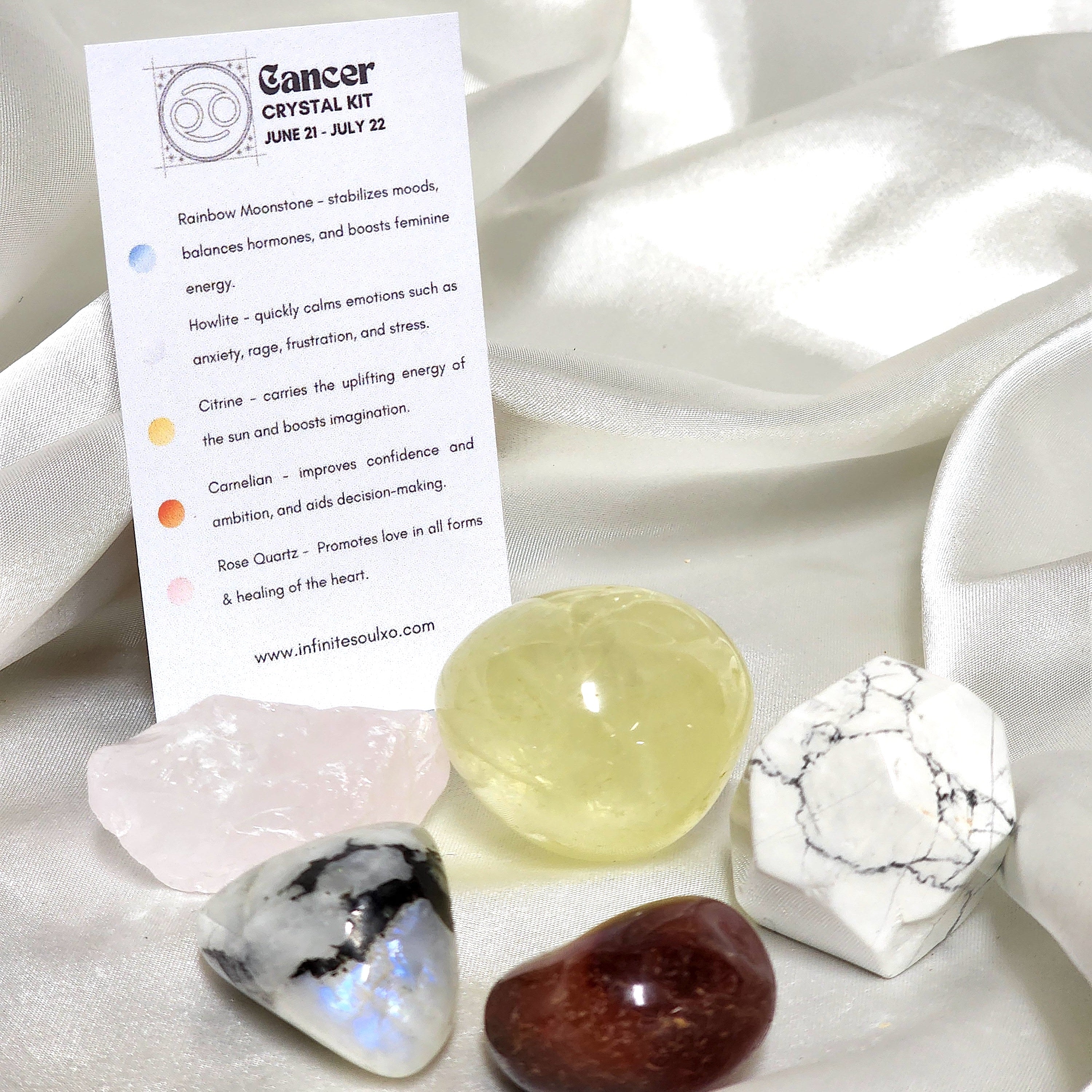 Star Sign Crystal Healing Kit for Cancer featuring Howlite, Carnelian, Rose Quartz, Rainbow Moonstone, and Citrine in a beautifully arranged display.