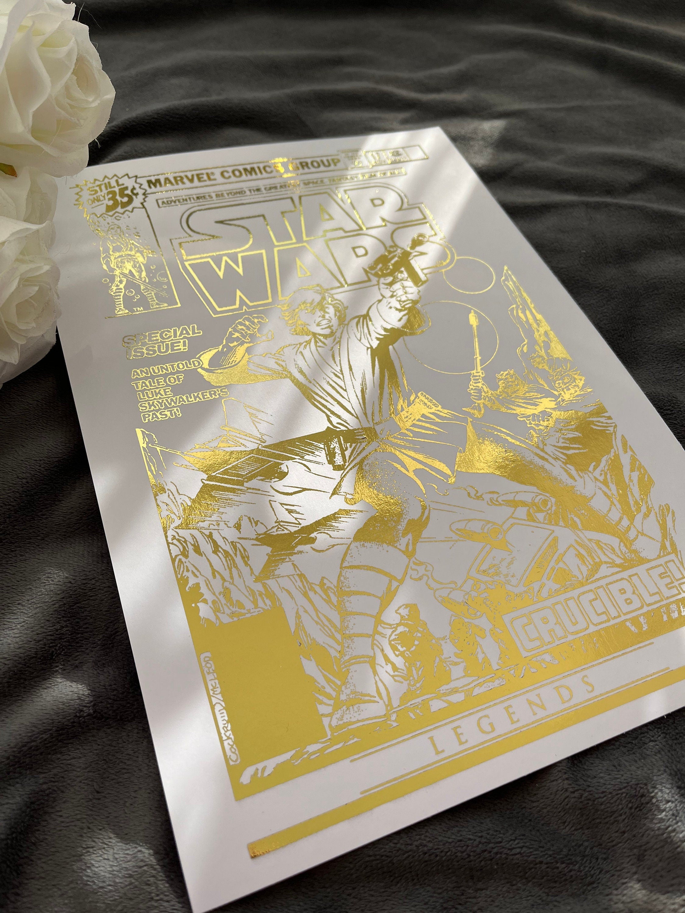 Star Wars comic cover foil print featuring iconic characters and gold foil detailing, perfect for fans and collectors.