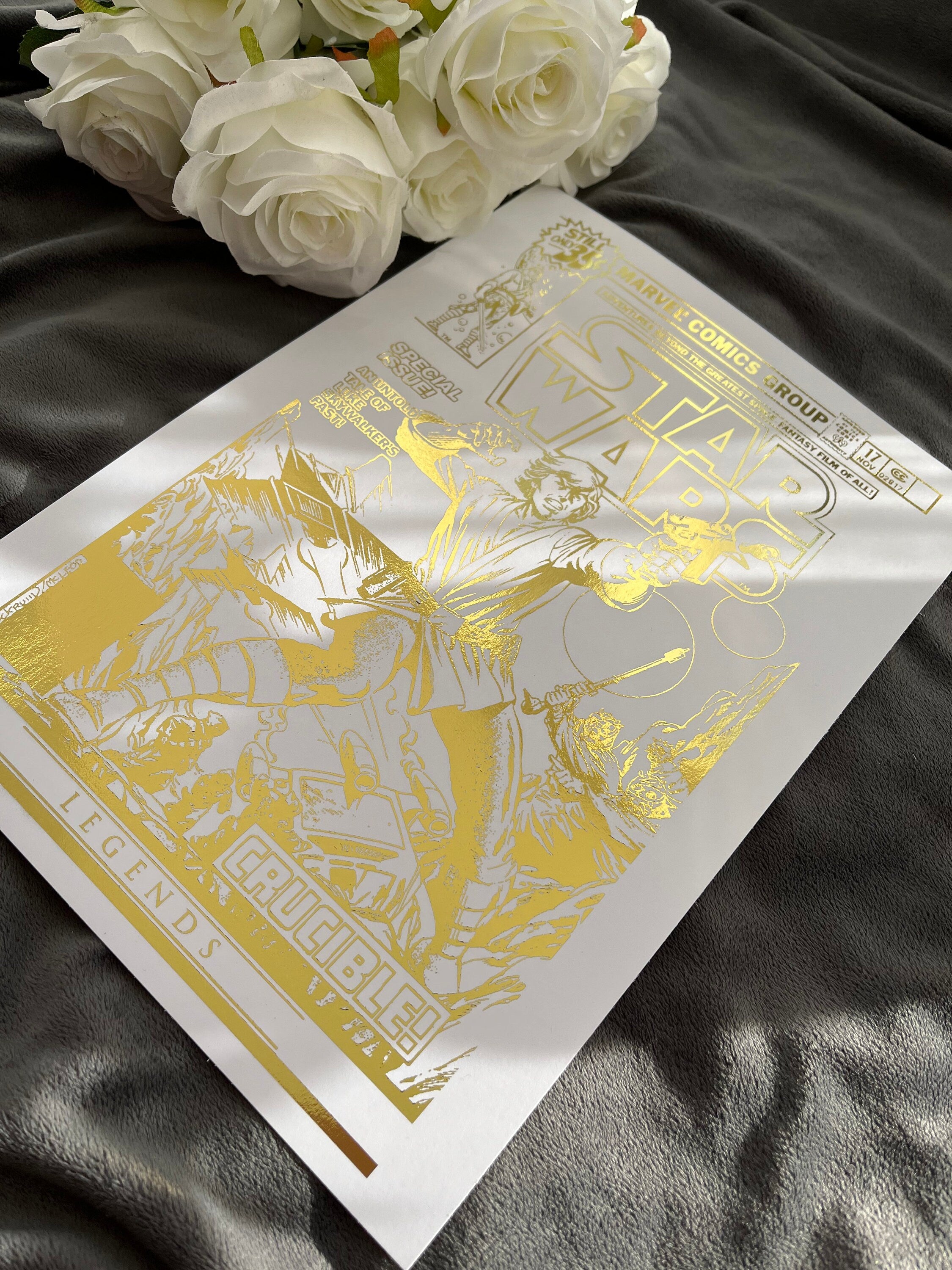 Star Wars comic cover foil print featuring iconic characters and gold foil detailing, perfect for fans and collectors.