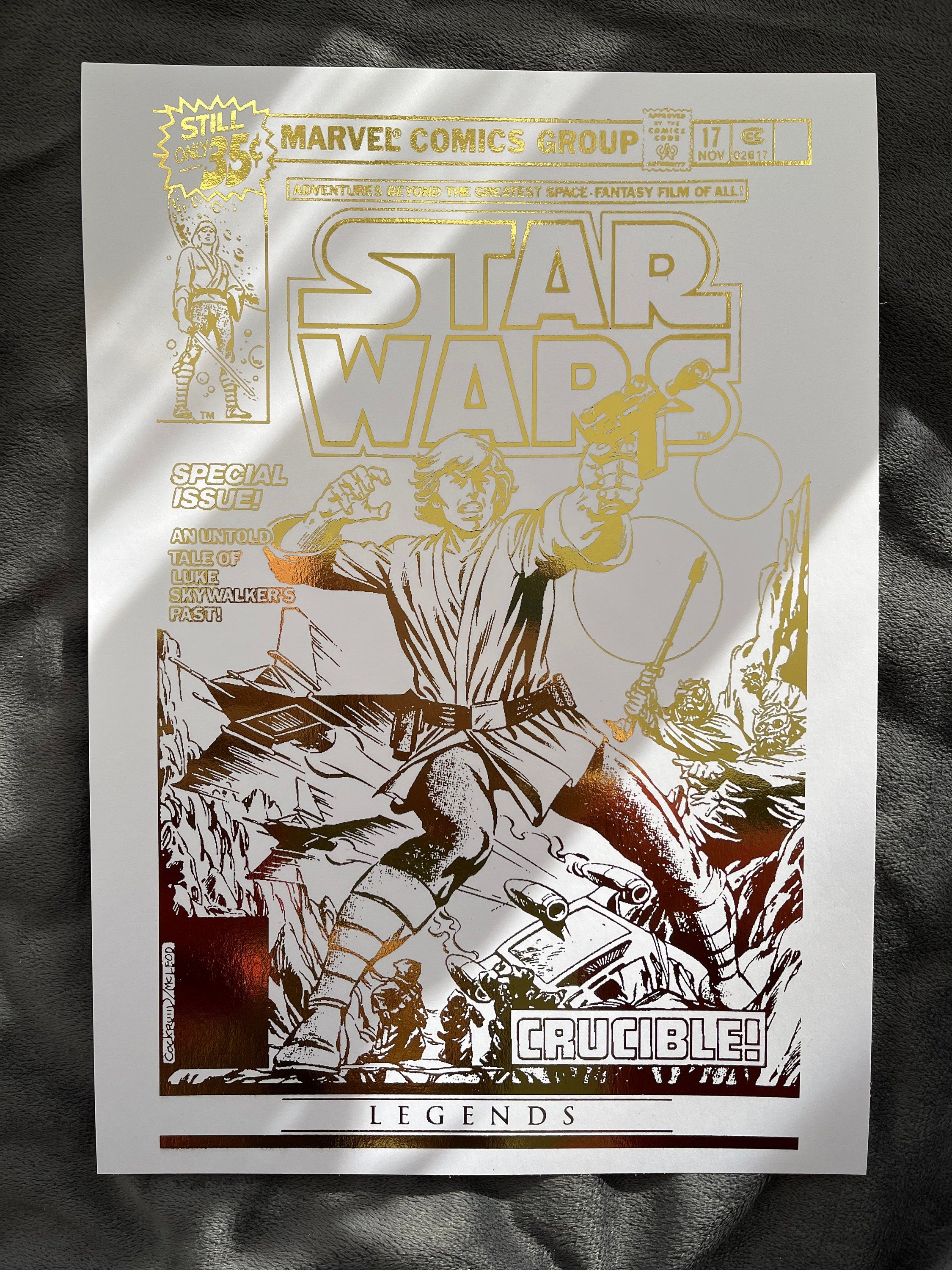 Star Wars comic cover foil print featuring iconic characters and gold foil detailing, perfect for fans and collectors.