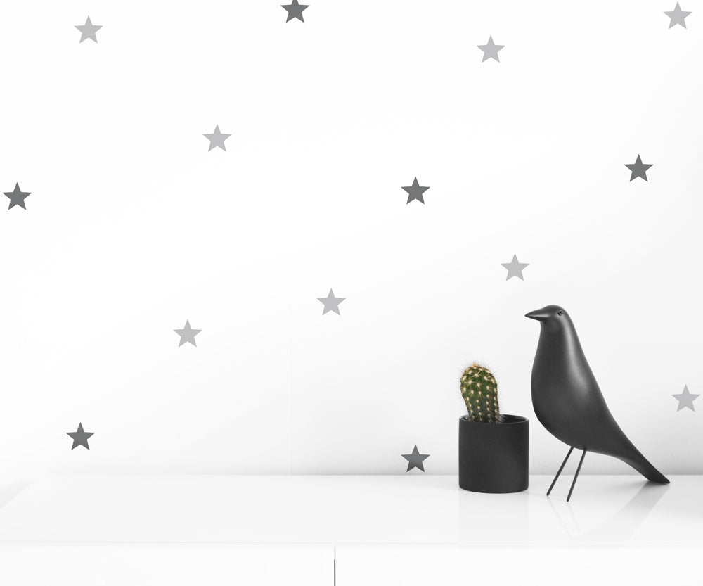 A collection of 50 self-adhesive stars in black and gray, perfect for wall decoration.